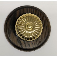 Single Button Dimmer Period Switch on a Circular Oak Pattress