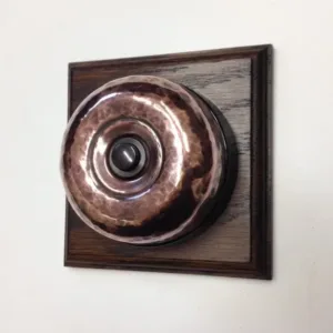 Single Button Dimmer Period Switch on a square Oak Pattress